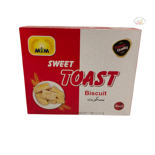 Boîte de biscuits MIM "Sweet TOAST Biscuit" de couleur rouge et blanche. L'emballage montre des morceaux de biscuits toasts et des grains de blé.
